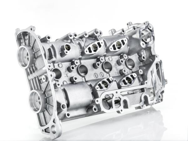 VW 1.5 L cam carrier with bearing frame.jpg